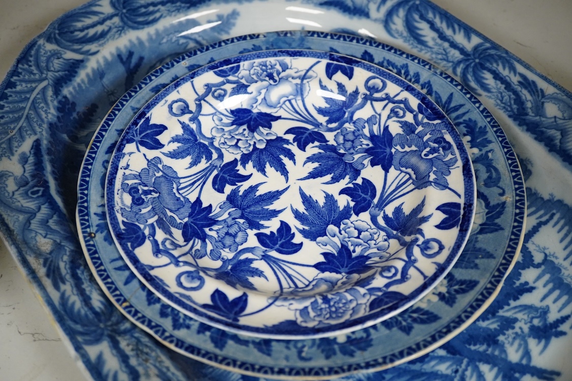 A Victorian blue and white pottery dish and two plates, one Wedgwood, largest 43cm